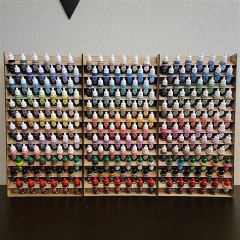 Army painter paint rack stl.  Upgrade your painting setup with precision...