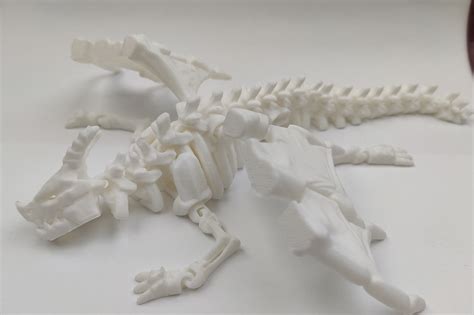 Articulated skeleton dragon stl.  Download thousands of 3D models and stl mode...