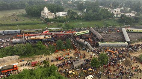 As India grieves train crash that killed 275, relatives wait for bodies of loved ones