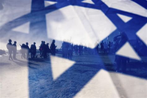 As Israel turns 75, its flag unfurls into deep divisions