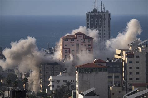 As strikes devastate Gaza, Israel forms unity government to oversee war sparked by Hamas attack