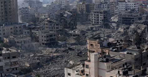As strikes devastate Gaza, Israel says it’s preparing for possible ground assault