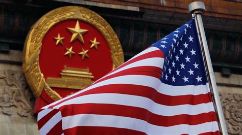 As world roils, US and China seek to ease strained ties and prepare for possible Biden-Xi summit
