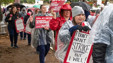 Ascension Health nurses rally at company headquarters today following strike votes