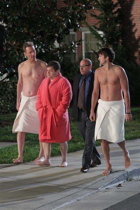 In the first peek at Ashton Kutcher 's debut on Two and a Half Men, Charlie Sheen's replacement leaves little to the imagination. "All will be revealed," the sign held by nearly nude ...