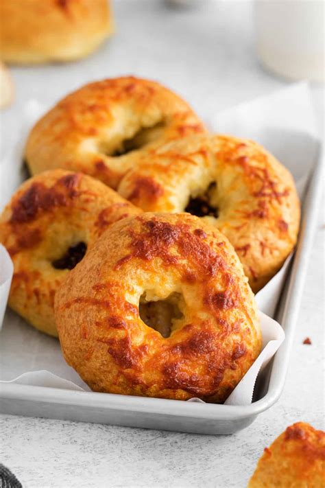 Asiago bagels. Keto Asiago Bagels are a basic fathead dough recipe made with almond flour, mozzarella cheese, and cream cheese. The added punch of asiago cheese gives it tremendous flavor. This 3 net carb recipe adds variety to the keto bread recipes. The Keto Asiago Bagel can be enjoyed on its own toasted, spread with cream cheese, used to make breakfast ... 
