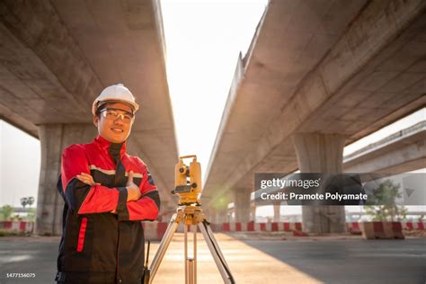 Asian Civil Engineers Stand Confident With With Surveyor Equipment …