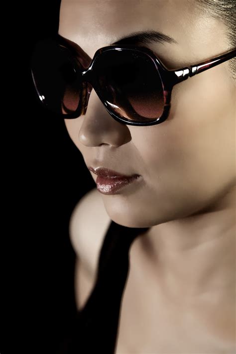 Asian fit sunglasses. Standard fit glasses are those on the next-door brick and mortar shelf in Europe and North America, even some in Asia. They are designed for a Caucasian face, oval faces, and lower cheekbones, where the bridge fit is wider to sit on the sides of a high-nose bridge, and the temples will sit well around a deeper head. 