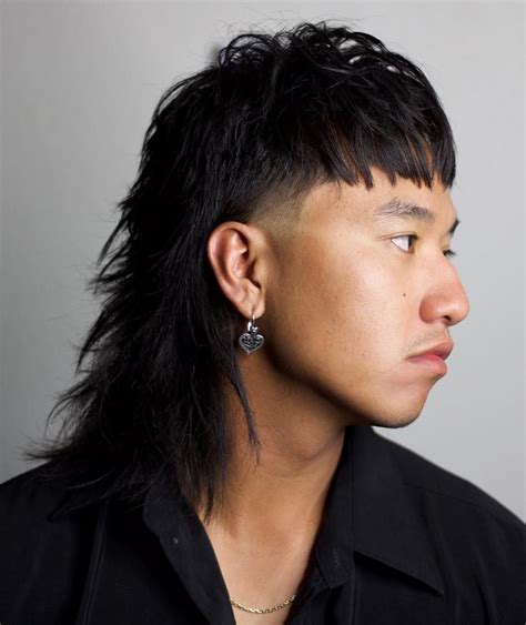 Asian mullet haircut. Asian Fade Mullet Asian Fade Mullet. The Asian Fade Mullet is a trendy haircut that combines two popular trends: the mullet and the fade while being the perfect combination of cool and wild. Not only does it look amazing, but it also helps to pull off a youthful and adventurous vibe. 