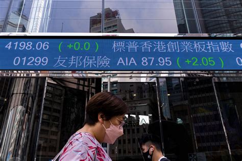 Asian shares mixed over economic growth, rate worries