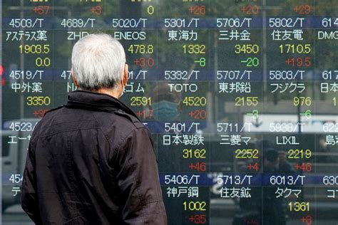 Asian shares moderately higher with focus on inflation data