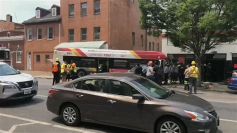 At least 15 injured as Baltimore bus crashes into 2 cars, building
