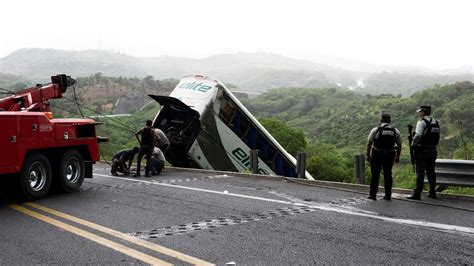 At least 17 dead after bus tumbles down steep hillside in Mexico
