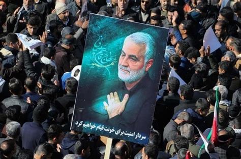 At least 20 people killed in blasts at ceremony honoring slain Iranian general, state-run news agency says