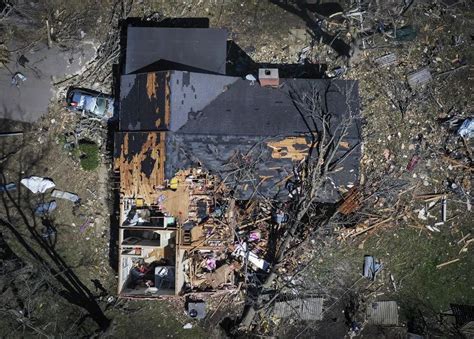 At least 26 dead after tornadoes rake US Midwest, South