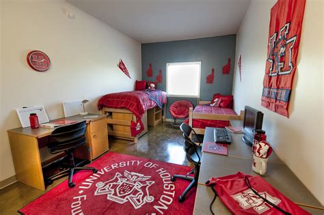 This is a dorm tour of the Honors suite style dorms at the University of Alabama! These are the more premium and more expensive dormant because unlike traditional style, these include four bedrooms separated by a living room and kitchenette that includes a full sized refrigerator and mircrowave. Amanda Caine Dorms.. 