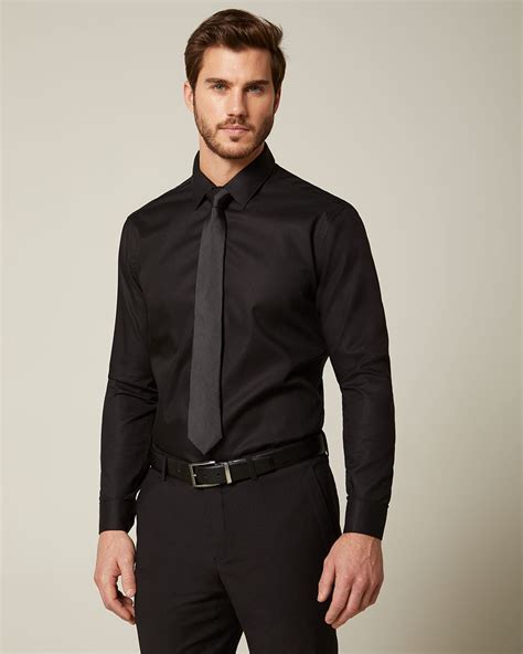 Athletic fit dress shirts. Key Differences Between Slim Fit and Athletic Fit Dress Shirts. The main difference between slim fit and athletic fit dress shirts lies in their design and who they're designed for. Slim fit shirts are narrower and more fitted, making them ideal for leaner body types. On the other hand, athletic fit shirts offer more room in the chest and ... 