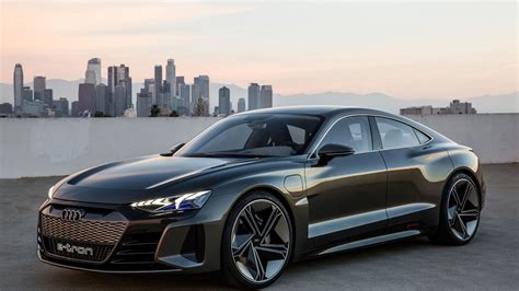 Audi e tron review. The 2022 Audi e-tron GT we tested was equipped with the optional 20-inch wheels, giving it an EPA-estimated range of 238 miles and a consumption rate of 41 kWh for every 100 miles driven. In ... 