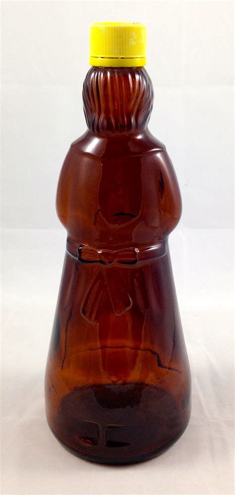 Vintage Syrup Bottle Aunt Jemima Container Glass Collectible Amber. Condition is Used. Shipped with USPS Priority Mail. from