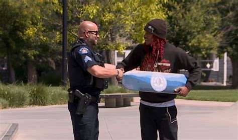 Aurora police officers gift custom skateboards to community