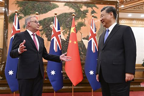 Australian and Chinese leaders meet in Beijing while their countries try to mend ties