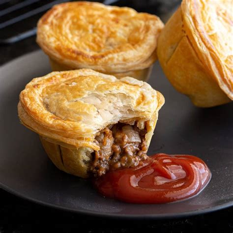 Australian meat pie. 1. Place the oil or butter in a large saucepan over medium-high heat. Add the onion and fry for a few minutes, stirring occasionally. Add the beef mince, breaking it up with a spoon and cook until ... 