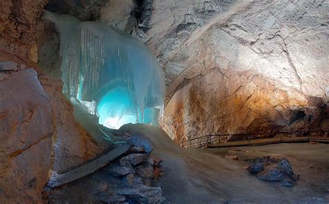 From May to October, about 200,000 tourists trek up Austria's Hochkogel mountain via cable car each year to see Eisriesenwelt's impressive maze of ice formations, including one resembling a ...