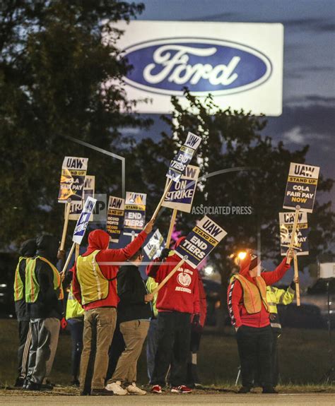 Auto workers escalate strike, walking out at Ford’s largest factory and threatening Stellantis