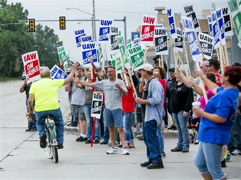Auto workers union adds highly profitable General Motors plant to strike as 5,000 workers walk out in Arlington, Texas
