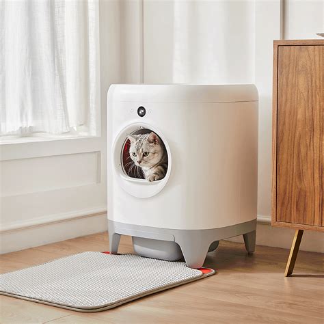 Automatic cat litter pan. PURAX is a smart solution to traditional litter box maintenance. Designed to accommodate cats up to 18 lbs, this scoop-free automatic cat litter box is suitable for multi-cat households with minimal footprints. The one-click cat litter disposal system provides users with a hassle-free experience. Users can remotely control the litter box and monitor … 