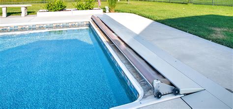 Automatic pool cover cost. Automatic pool covers provide safety, facilitate the pool's maintenance, and translate to cost savings since they aid in conserving heat · The cost averages ... 