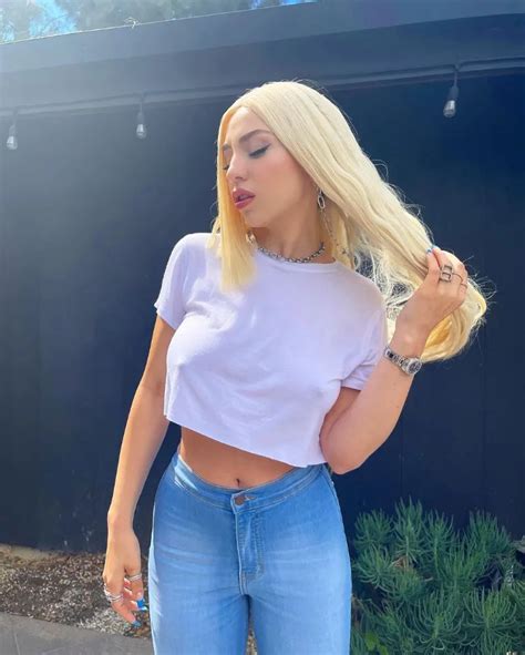 The 27-year-old pop star put her sensational figure on display in a quirky bikini while trekking through the sand towards a luxe yacht with her vacation crew. View gallery. Day off: Ava Max took a ...