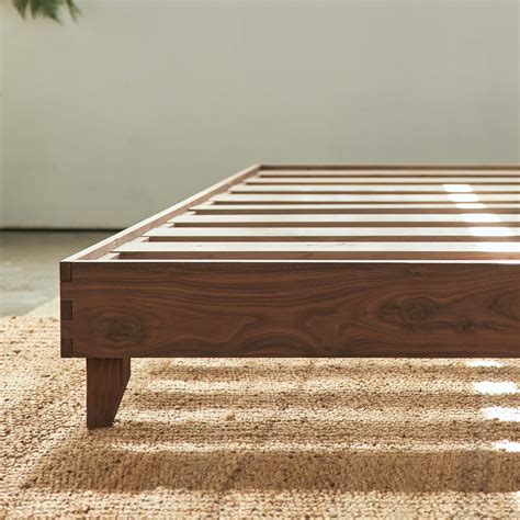 Avocado bed frame. Inspired by mid-century design, the bed employs clean, simple lines to create a classic piece that will last generations. We craft our Mid-Century Modern Bed Frame with sturdy natural timber and assemble it with eco-conscious materials. We offer two constructions: reclaimed wood or 100% walnut. The slats in the reclaimed wood model are sourced ... 