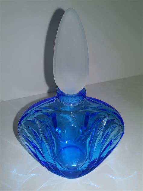 Avon Perfume Bottle - Blue and Silver Bell - 1976. (163) $21.70. $31.00 (30% off) Avon Perfume Bottle - Vintage Bell Shape Avon London Perfume Bottle - Blue Glass Perfume Bottle - Royal Eau De Cologne Bottle. G14-133.. 