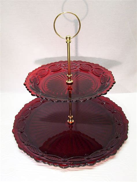 Vintage Avon ruby red glass bread and butter plates, Set of 2 plates, Cape Cod Collection, original box. (866) $19.75. Avon RUBY RED CAPE Cod, Replacement Dishes, Roman Rosette Pattern. Dinner Plates, Dessert Plates,Gravy Bowl,Fruit Bowls,Goblets,12ozTumblers. (493). 