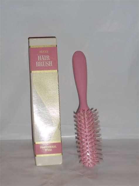 This is a BRAND NEW Vintage Avon Half Round Brush. The original box is in good shape with some wear and tear, but has not been crushed or broken, as you can see in the picture. This box has NOT been opened. Original Avon ad read as follows: "AVON HALF-ROUND BRUSH - Deep penetration brushing for dry hair; all lengths and textures. 8" long."