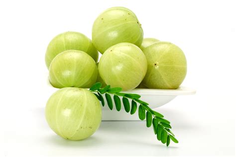 Awla - 1. One serving of amla is 1 to 3, depending on the health conditions. I use 3 medium sized amlas per serving. Rinse your amlas under running water and add them to a bowl of salted water. Soak for 5 mins and scrub them gently with a vegetable brush to get rid of dirt and deposits, if any. Slice the amla to 3 portions first.