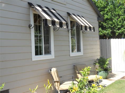Awning from house. An awning is a lightweight frame with a cover installed outdoors above windows and doors to protect against the elements. The structure is typically supported using beams on … 