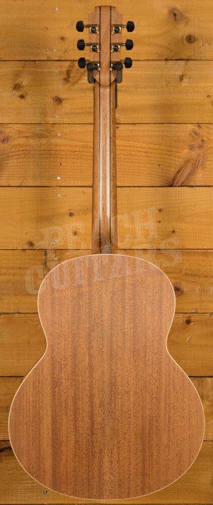 B string acoustic guitar.  Featuring a mahogany body, Sitka spruce top, .  Just generall...