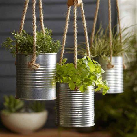 Brilliant Garden Art: How to Repurpose Old Cans Into Stunning Planters ... - raincitystudios.com