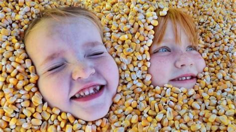 BURiED in CORN!! Niko & Adley slide down Pumpkin Castle a ... - YouTube