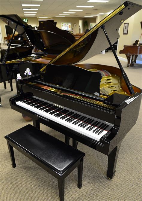 Baby grand piano. This Boston GP-163 baby grand piano, measuring 5’4”, boasts a rich tone and high-polish ebony finish from 1992. Crafted by Kawai Piano Company to Steinway’s stringent standards, it incorporates Steinway’s patented rosette-shaped flanges and all-wood action parts, ensuring unparalleled keyboard feedback, stability, and dynamic range.”. 
