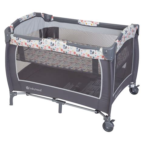 Your little one will feel comfy and secure in the adorable Lil Snooze Deluxe II Nursery Center Playard. Removable napper with canopy is perfect for a little shuteye throughout the day and the hanging toys keep them entertained while awake. Diaper time is a breeze with the flip away changing table and storage pocket.. 