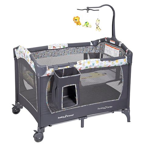 The Dreamland Nursery Center designed by Baby Trend features a napper, full-size bassinet, padded floor board, flip-away changing table, large parent organizer and strong wheels. The napper with canopy has two plush toys to entertain your little one and the electronic center allows your baby to sleep with music, sounds and night light.. 