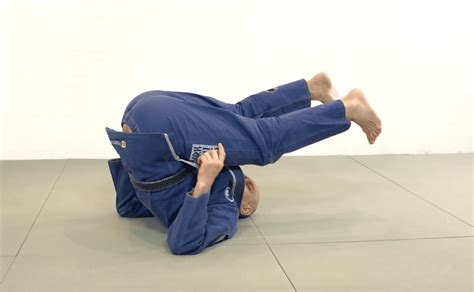 Backrolling. The back roll (or the backwards shoulder roll) is one of the most important movements in BJJ. Honestly, it’s right up there with shrimping and bridging! Most fundamentally, the back roll allows you to fall backwards and roll over your shoulders rather than rocketing into the mat and taking the full impact on your back and/or head. But you … 