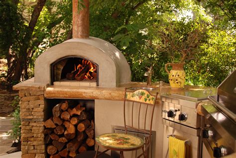 Backyard pizza. Keep wood storage level about 1 1/2 foot high. Make a semi-circular arches out of 3/4 inch plywood to be used for wood storage and oven entrance. Build up the brick courses using recycled bricks and standard mortar mix from a DIY store. Lay the 110mm-thick inlets on the roof. Make the entrance arch and baking surface. 
