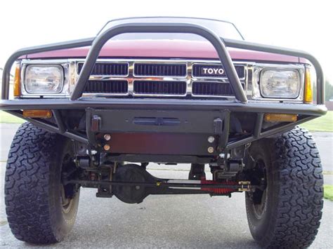 95-04 Toyota Tacoma flat top winch bumper with our custom rock sliders and rear tube bumper. $600.00. 95-04 Toyota Tacoma winch bumper with smooth sheet metal on top. $600.00. 05-11 FLAT TOP TOYOTA WINCH BUMPER. $625.00. 79-95 Toyota 4x4 winch bumper. $525.00. Badlandbumpers manufactures a large selection of custom Bumpers, Rock Sliders and .... 