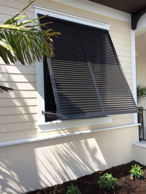The shutter itself fits to the top of the window frame, attached with hinges so it can tilt out. Within the frame of the Bahama shutters louvers are fitted. These can be tilted open to give ventilation through the window. For the frame of the shutters you should use treated wood or cedar that is 1-inch by 2-inches or 1-inch by 4-inches.. 