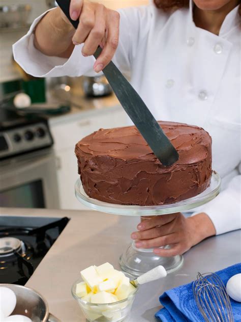 Baking a cake. Method. Preheat the oven to 170C/325F/Gas 3. Take a very large mixing bowl, put the flour and baking powder in a sieve and sift it into the bowl, holding the sieve high to give it a good airing as ... 