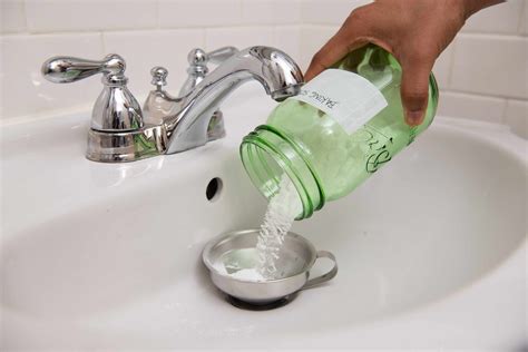 Baking soda and vinegar for clogged drain. Pour vinegar: Pour the rest of the hot vinegar down the drain (you will need to reheat it if you leave it overnight). Pour hot water (optional): If you suspect a clog, you’ll need to flush it away. Boil two cups of water and pour it down the drain. Another option for using baking soda and vinegar is to add one cup of baking soda and ½ cup of ... 